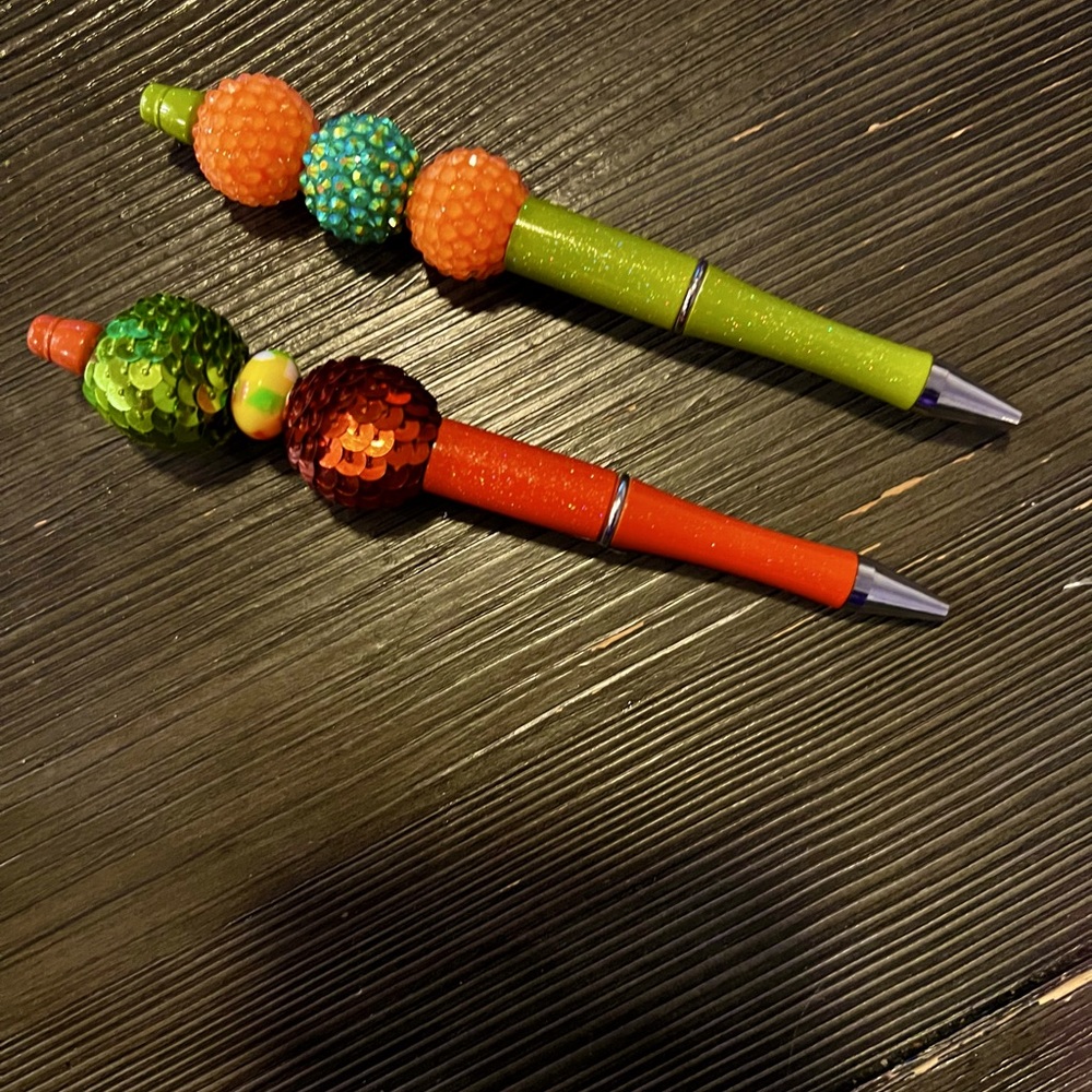 2 University of Miami Hurricanes bubble bead pens
